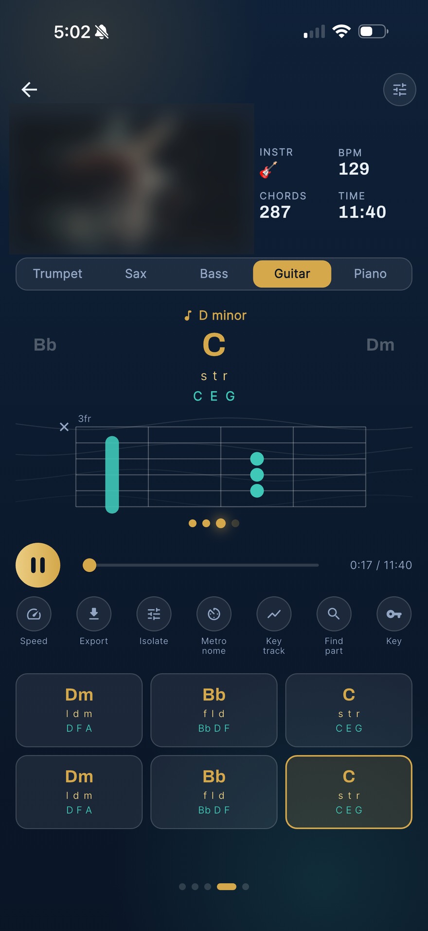 Instrumentalist on a phone, chords and fretboard